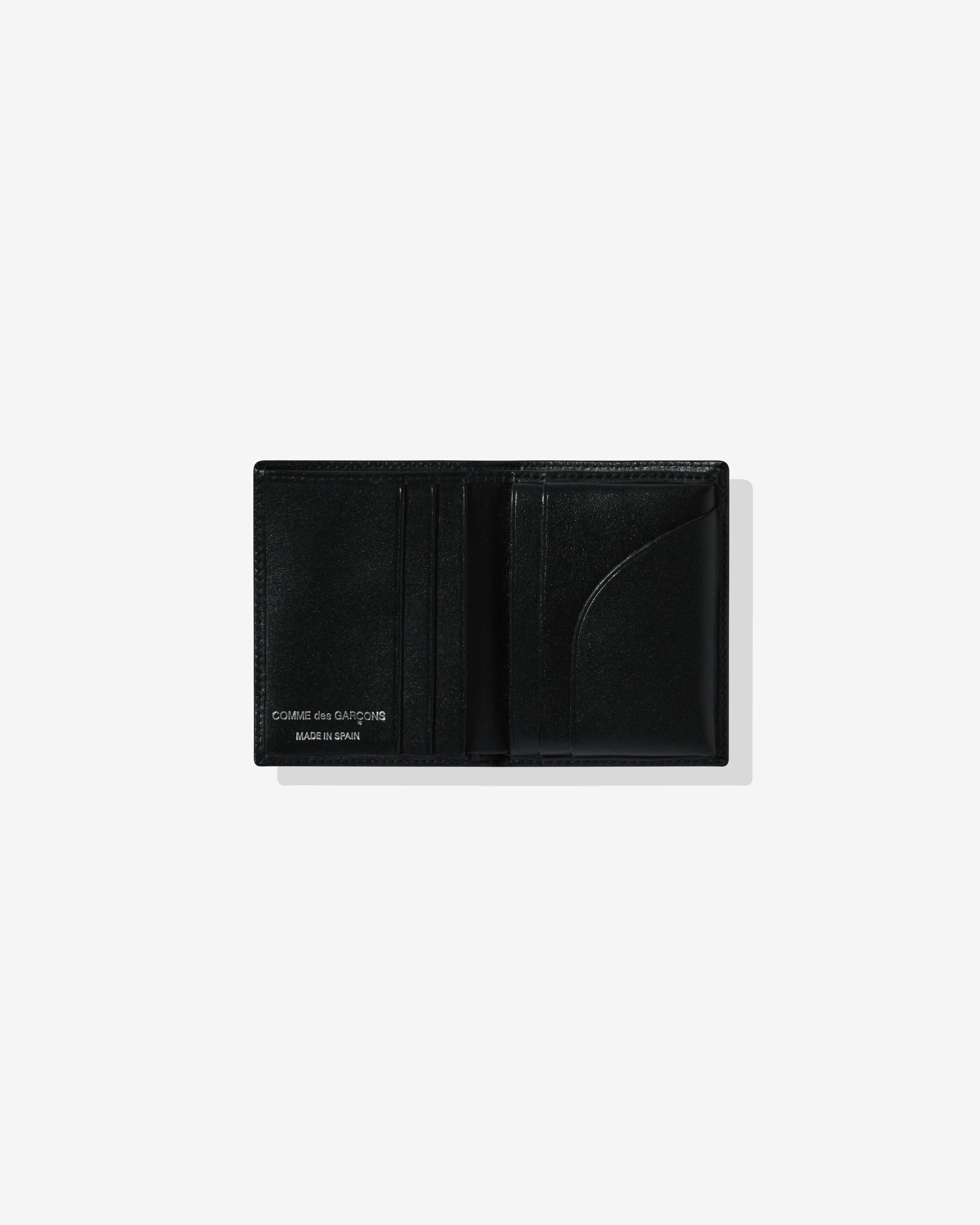 CDG Wallet: Silver Eyelet Bifold Wallet (Black SA0641SE) DSML E-SHOP