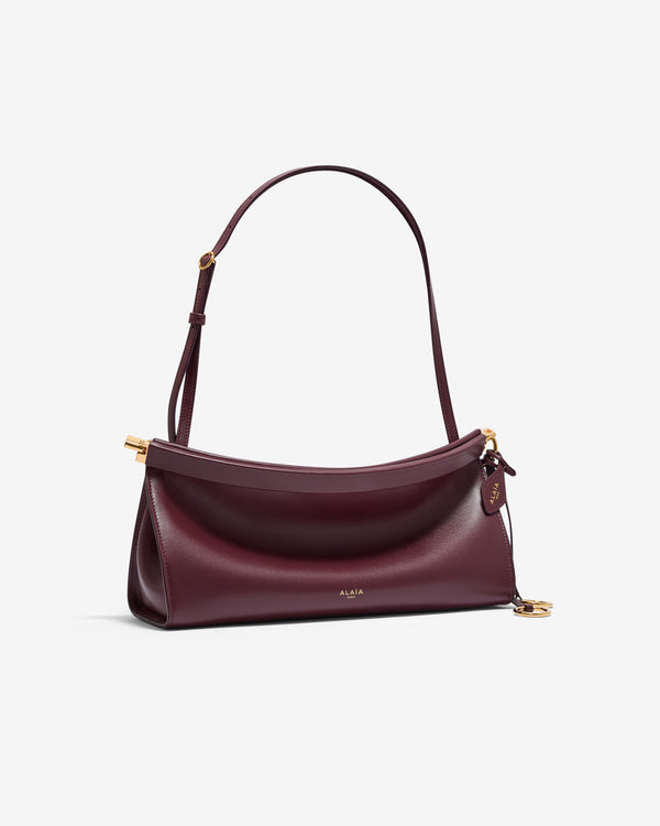 Alaïa - Women's Le Click East West Medium Bag - (Garnet Red)