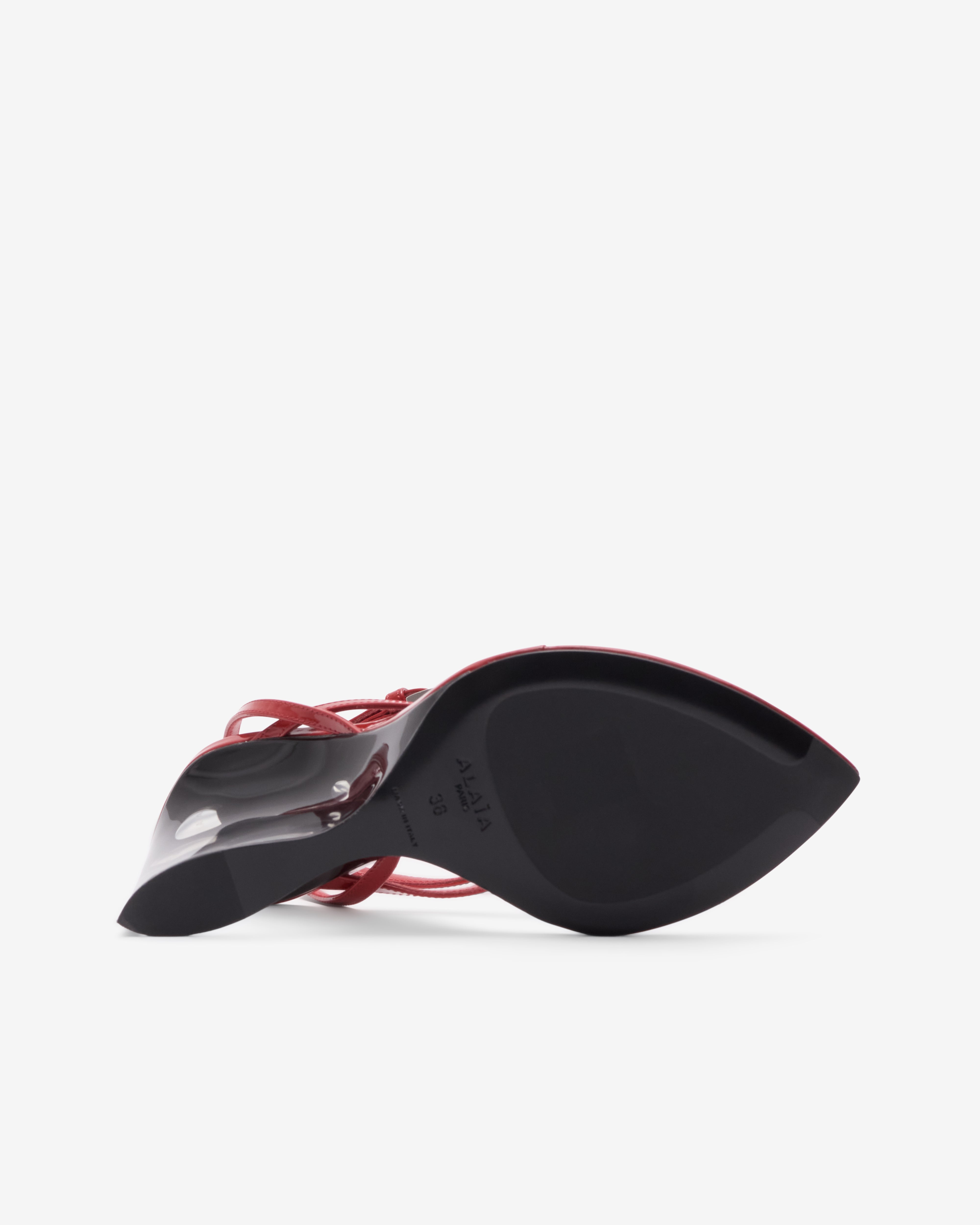 Alaïa: Women's invisible Thong Sandals (Burnt Orange) | Dover