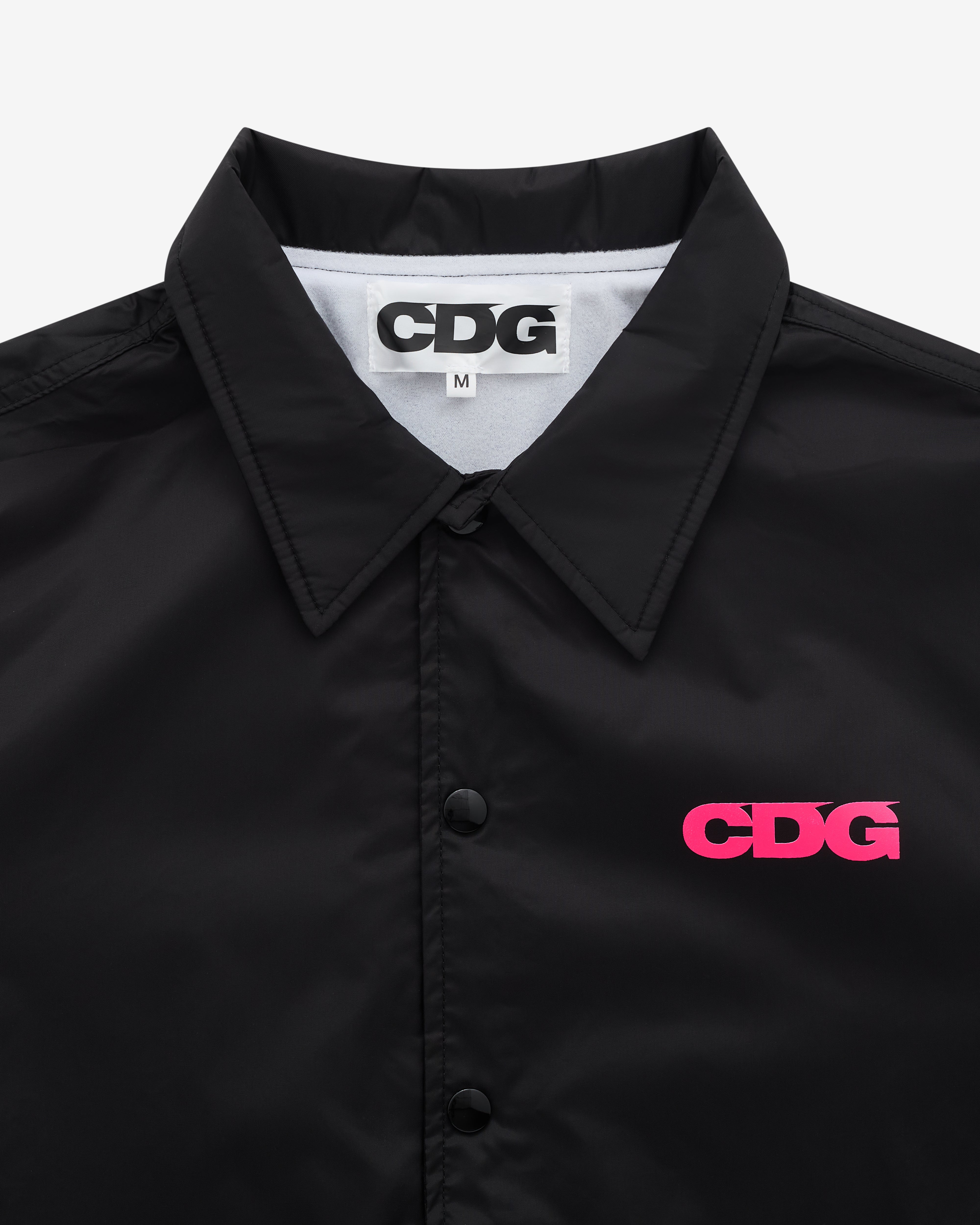 CDG: Pink Logo Coach Jacket (Black) | Dover Street Market London