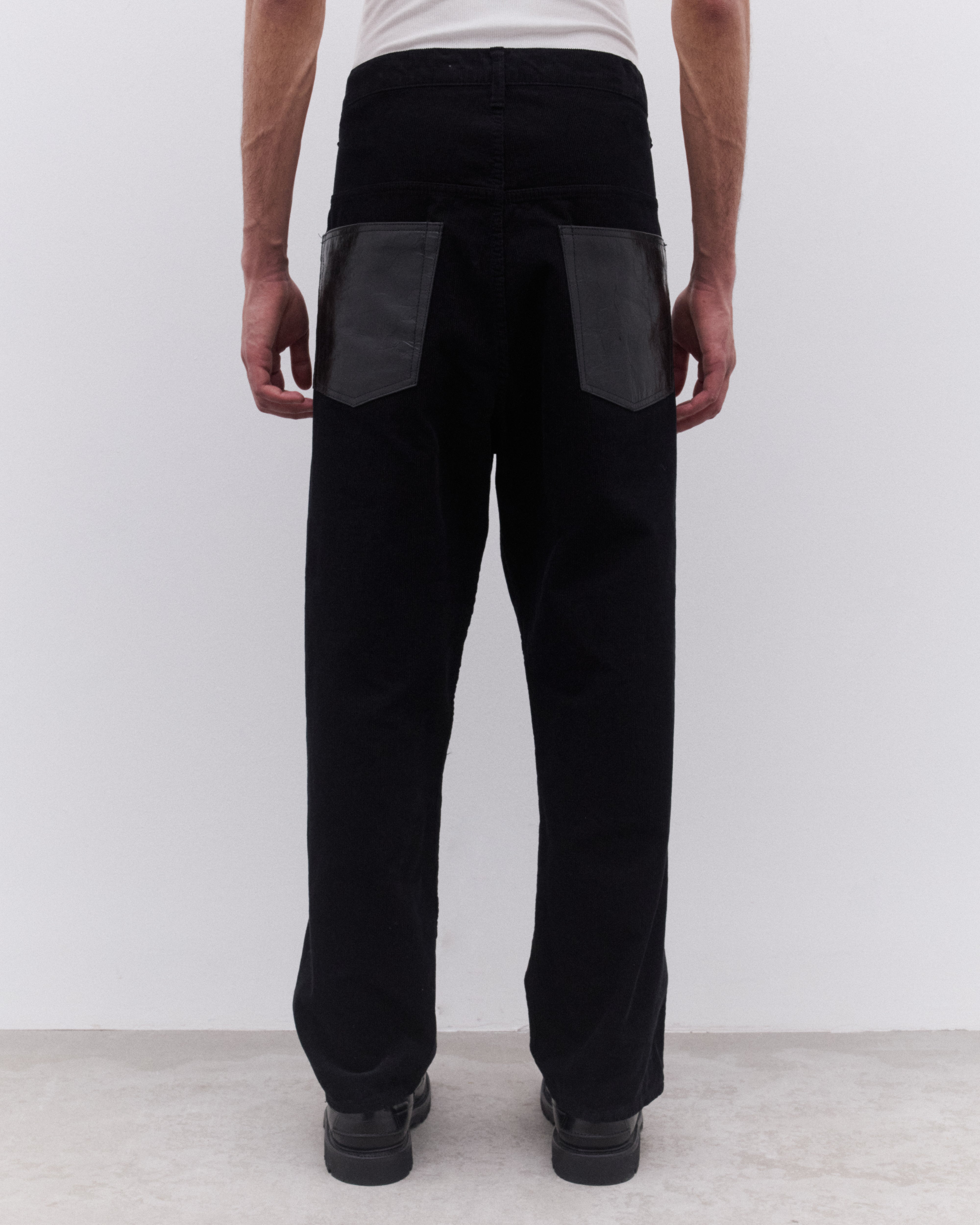 Junya Watanabe Man: Men's Needle Cord Tapered Trousers (Black