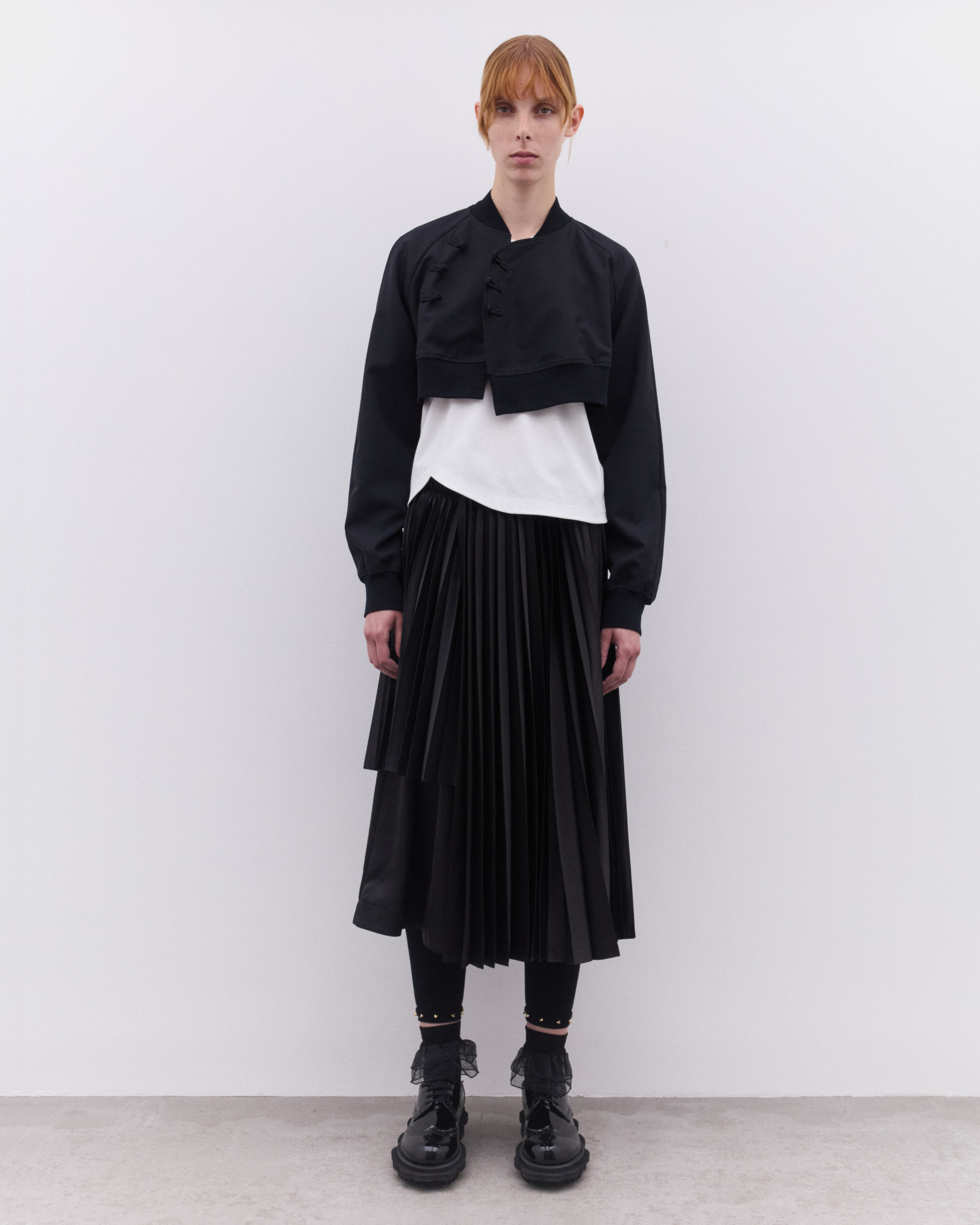 Noir Kei Ninomiya: Women's Asymmetric Pleated Skirt (Black) | DSML