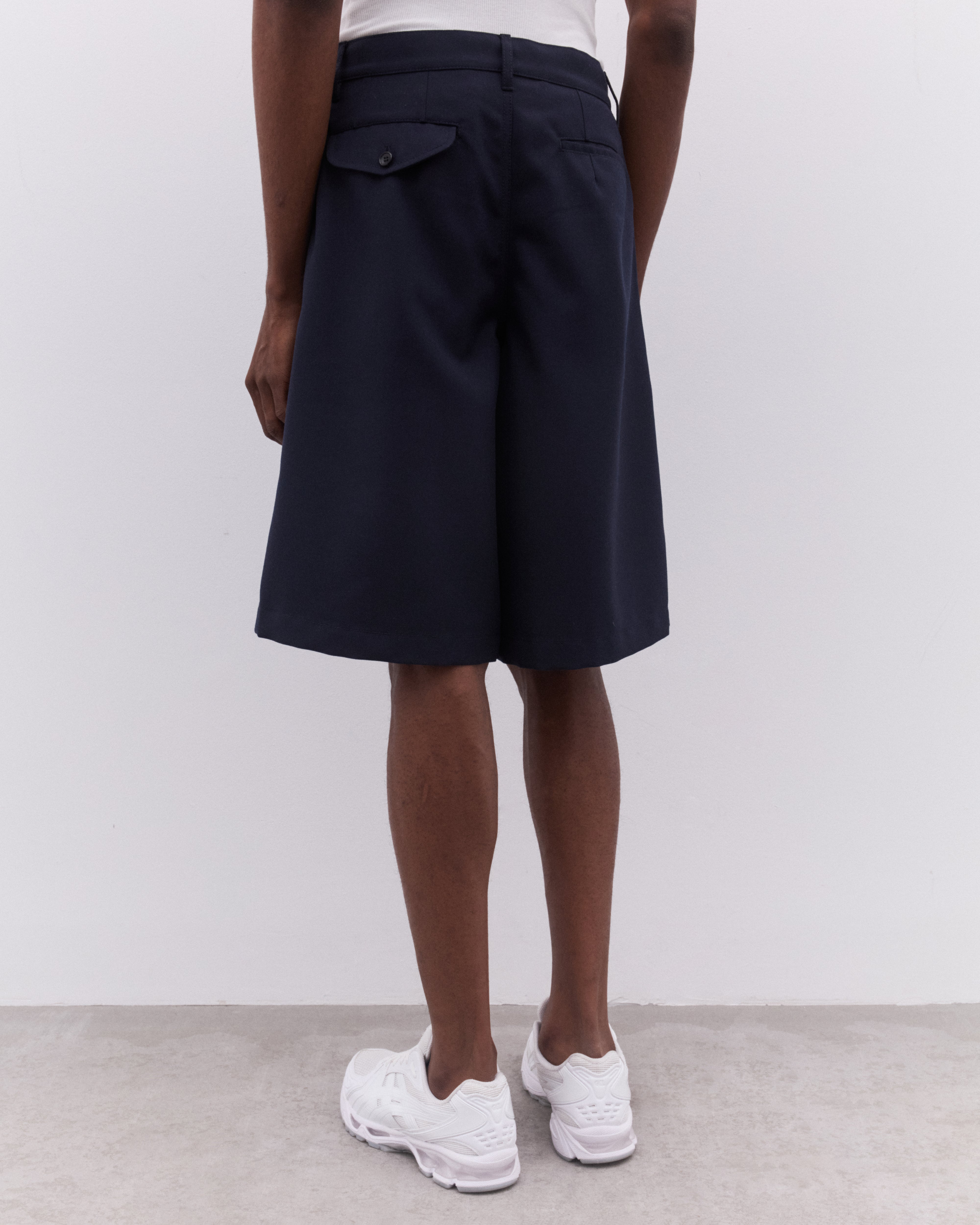 CDG Shirt: Men's Pleated Shorts (Navy) | Dover Street Market London