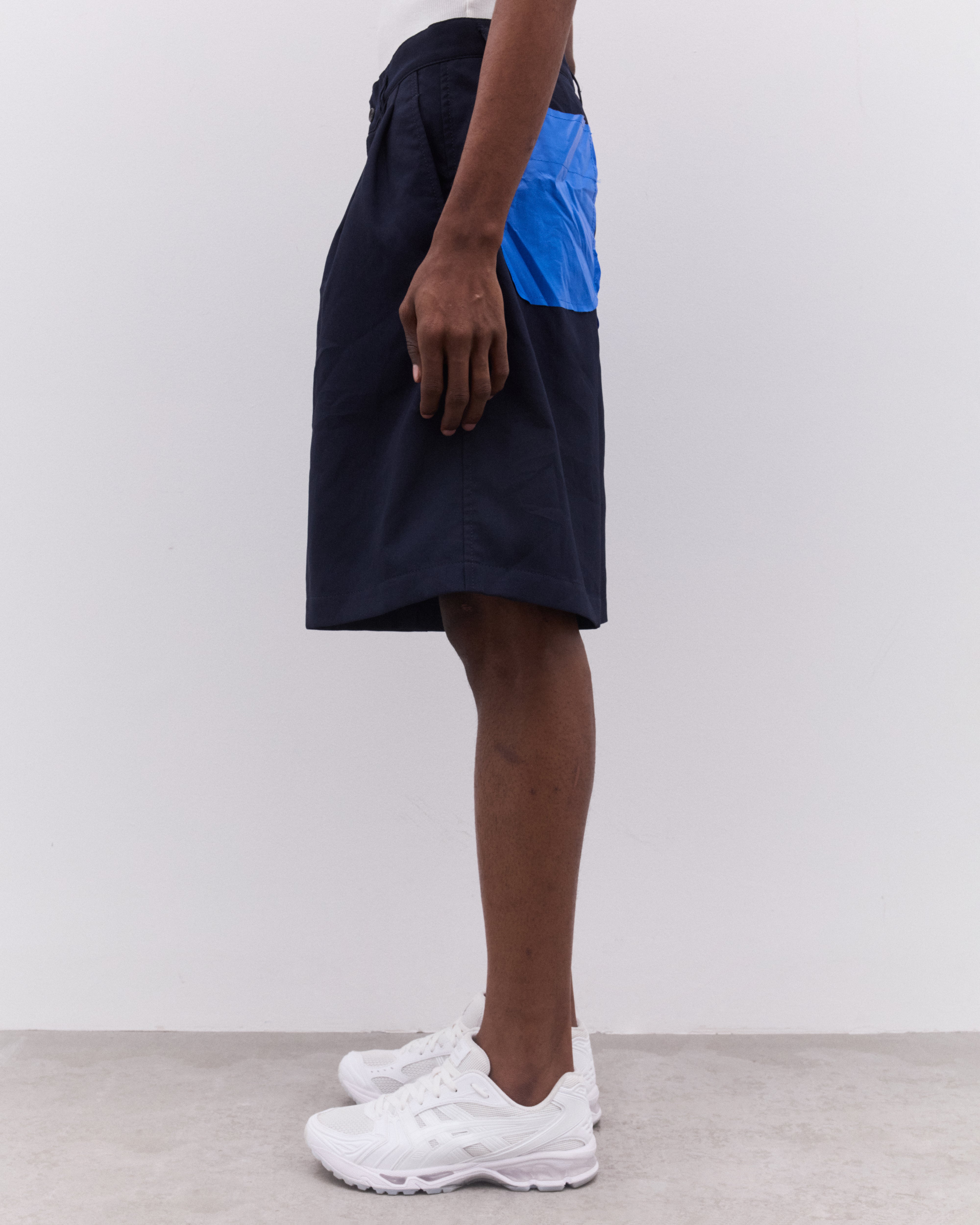 CDG Shirt: Men's Pleated Shorts (Navy) | Dover Street Market London
