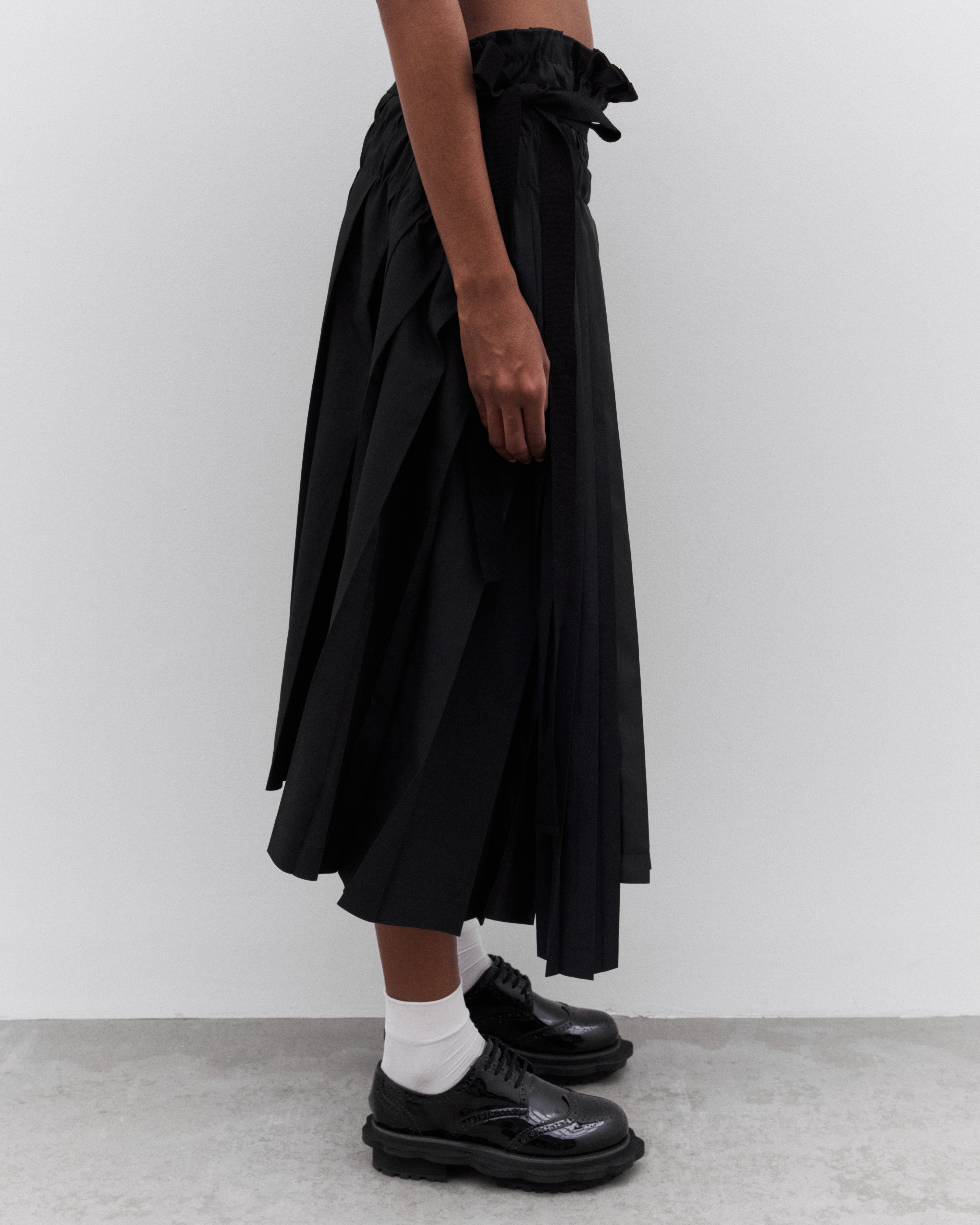 Tao: Women's Pleated Asymmetric Skirt (Black) | Dover Street