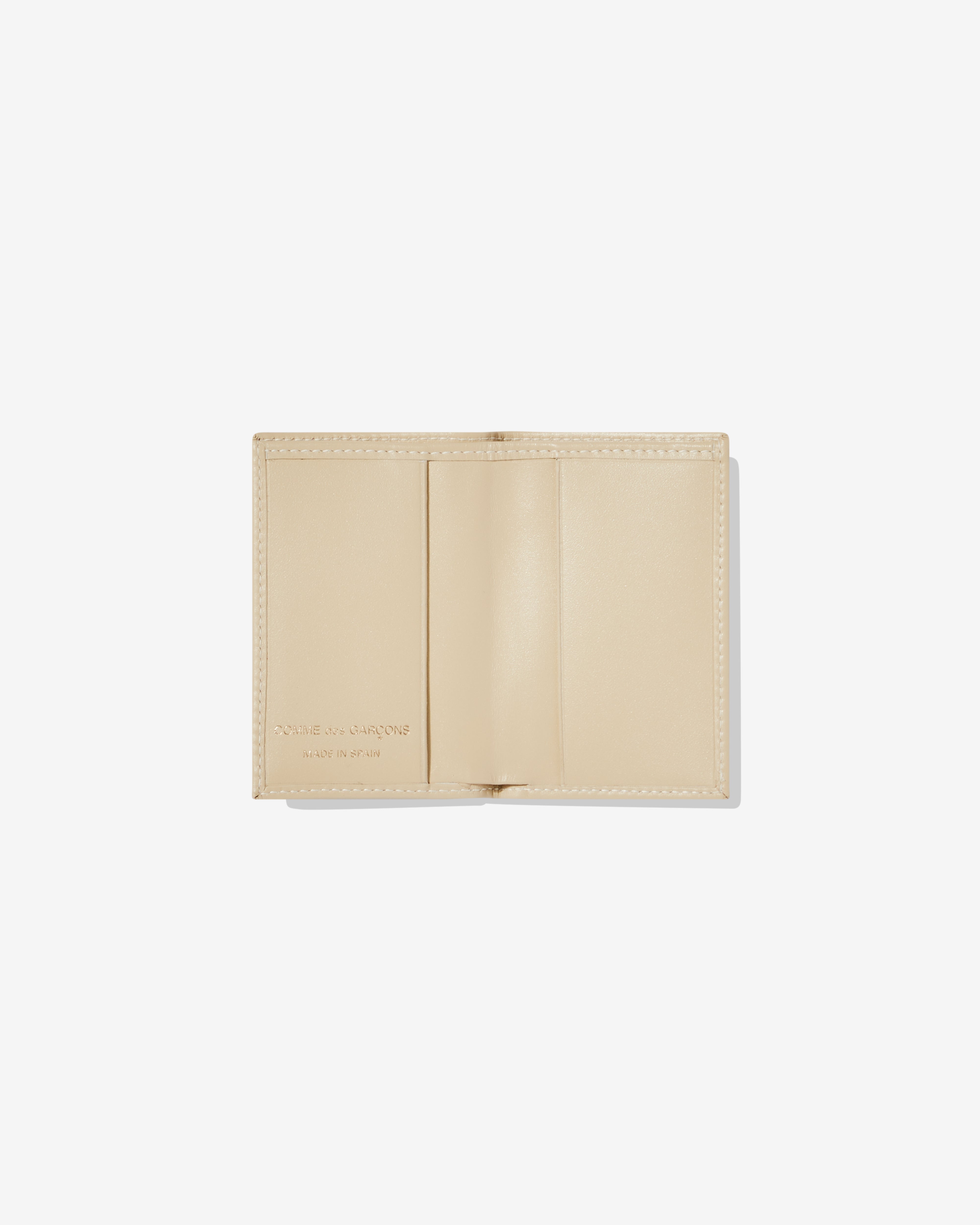 CDG Wallet: Classic Leather Bifold Wallet (Off-White SA6400) | DSML E-SHOP