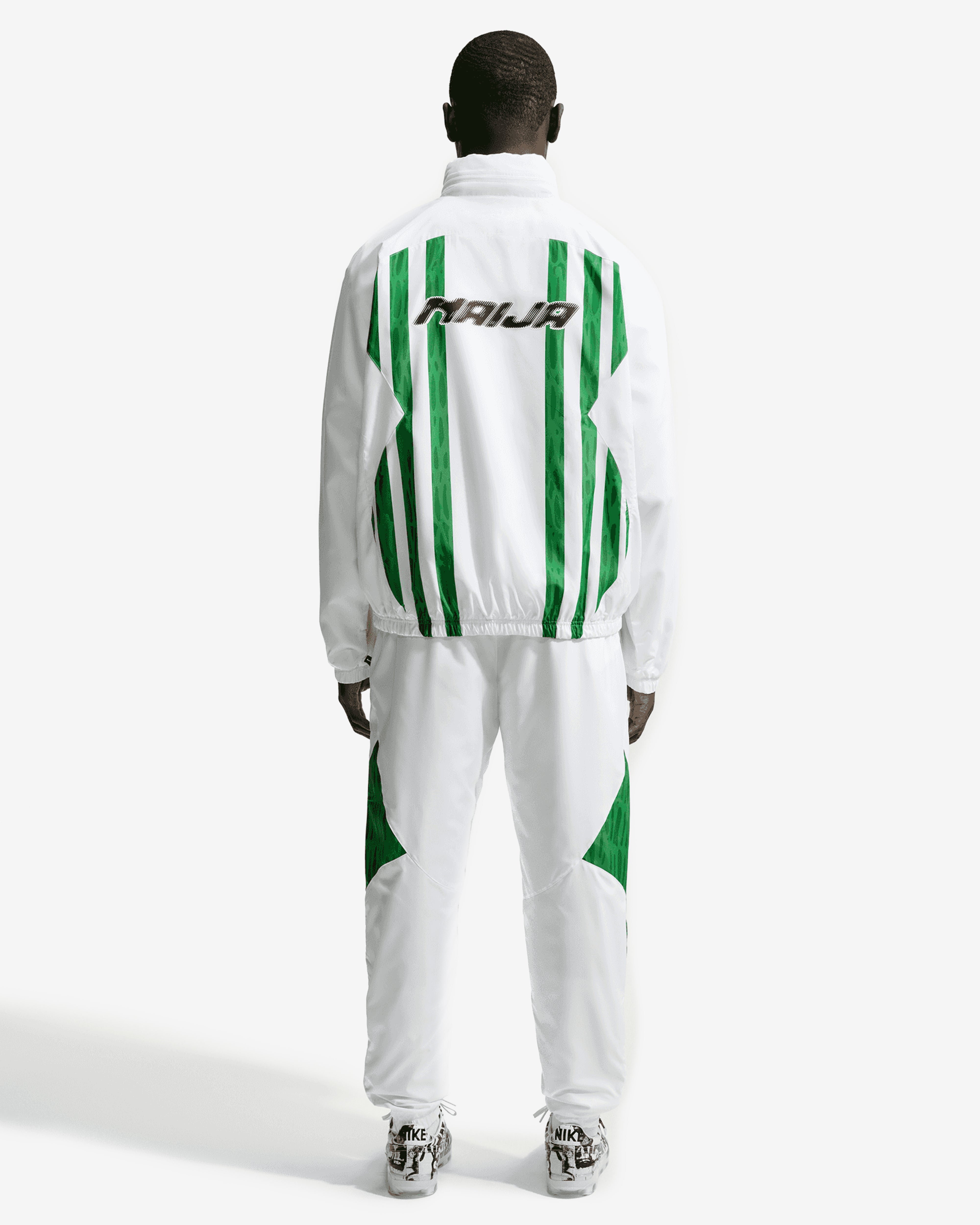 Nike: Slawn Nigeria Lightweight Pant (White/Black) | Dover Street