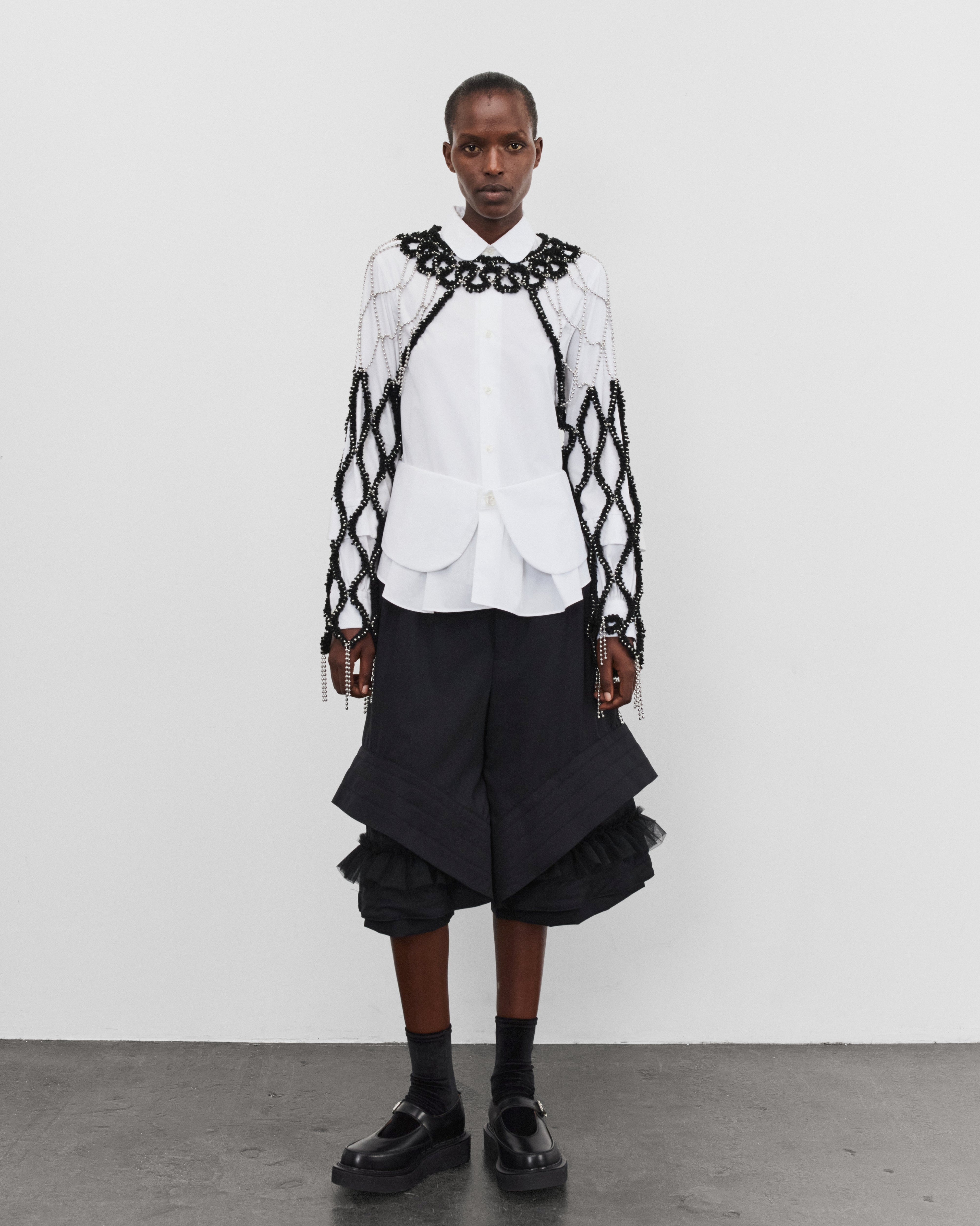 Noir Kei Ninomiya: Women's Open Work Sleeve (Black) | Dover Street