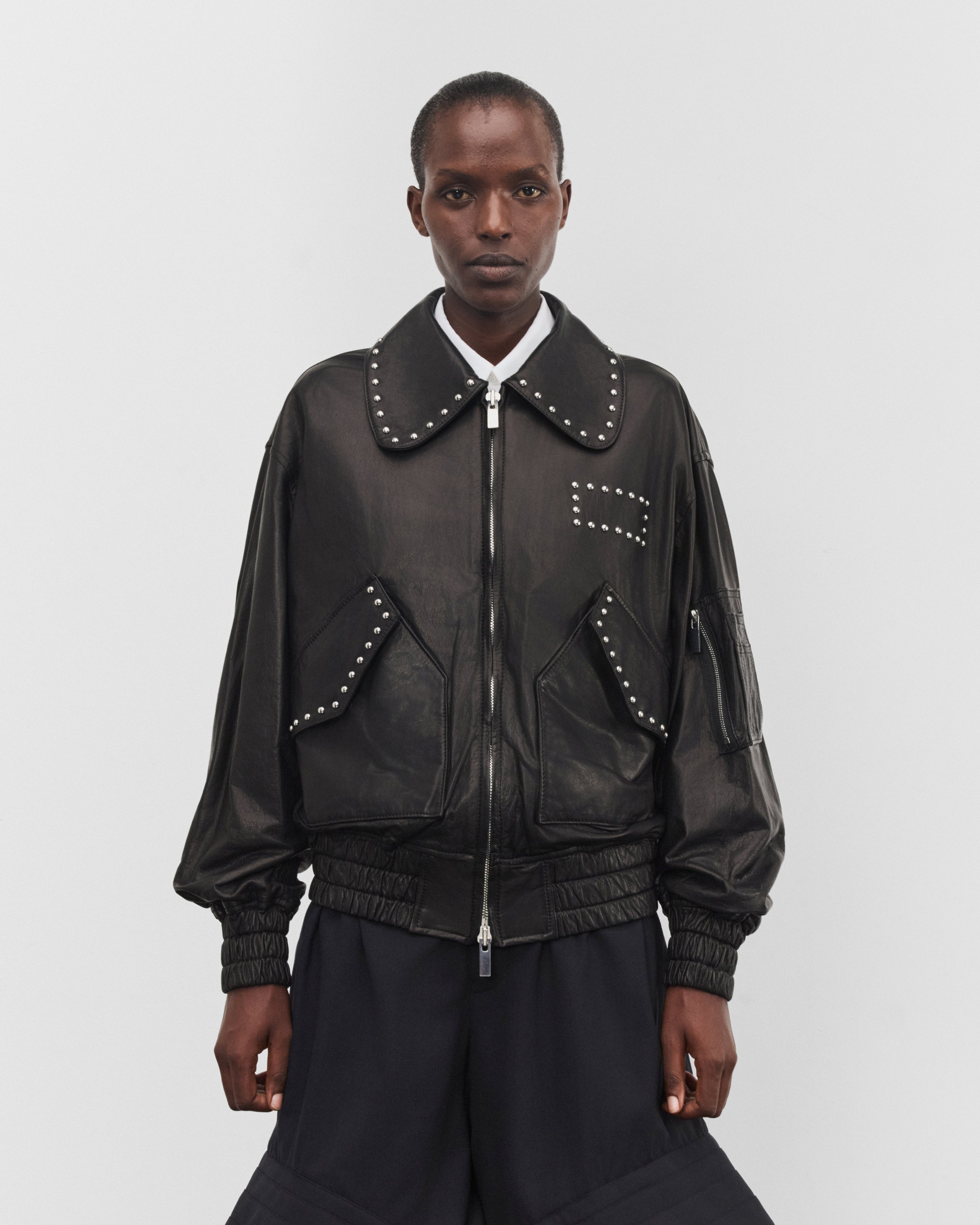 Noir Kei Ninomiya: Women's Studded Leather Jacket (Black) | Dover