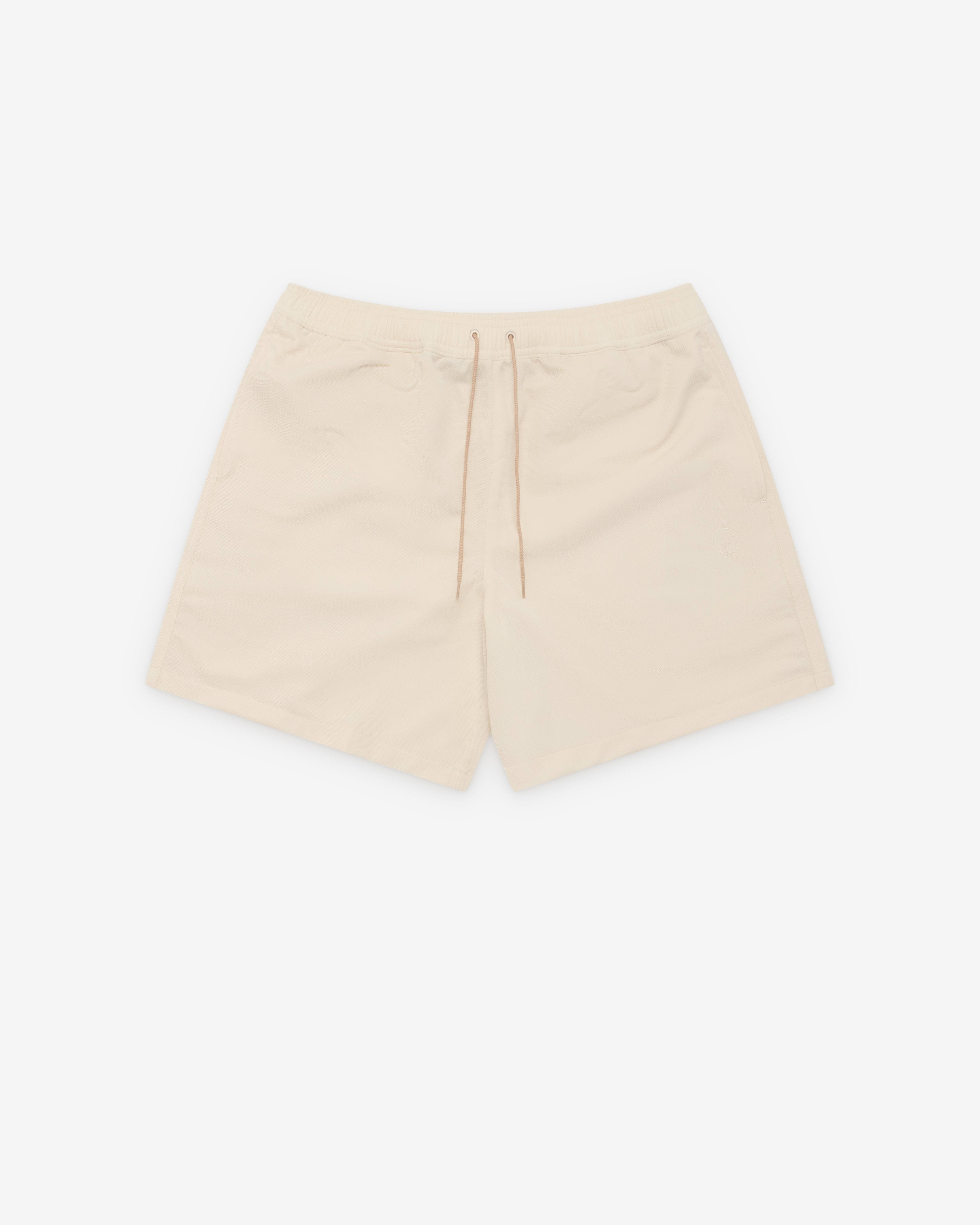 Our Legacy Work Shop: Sports Shorts (Beige) | Dover Street Market