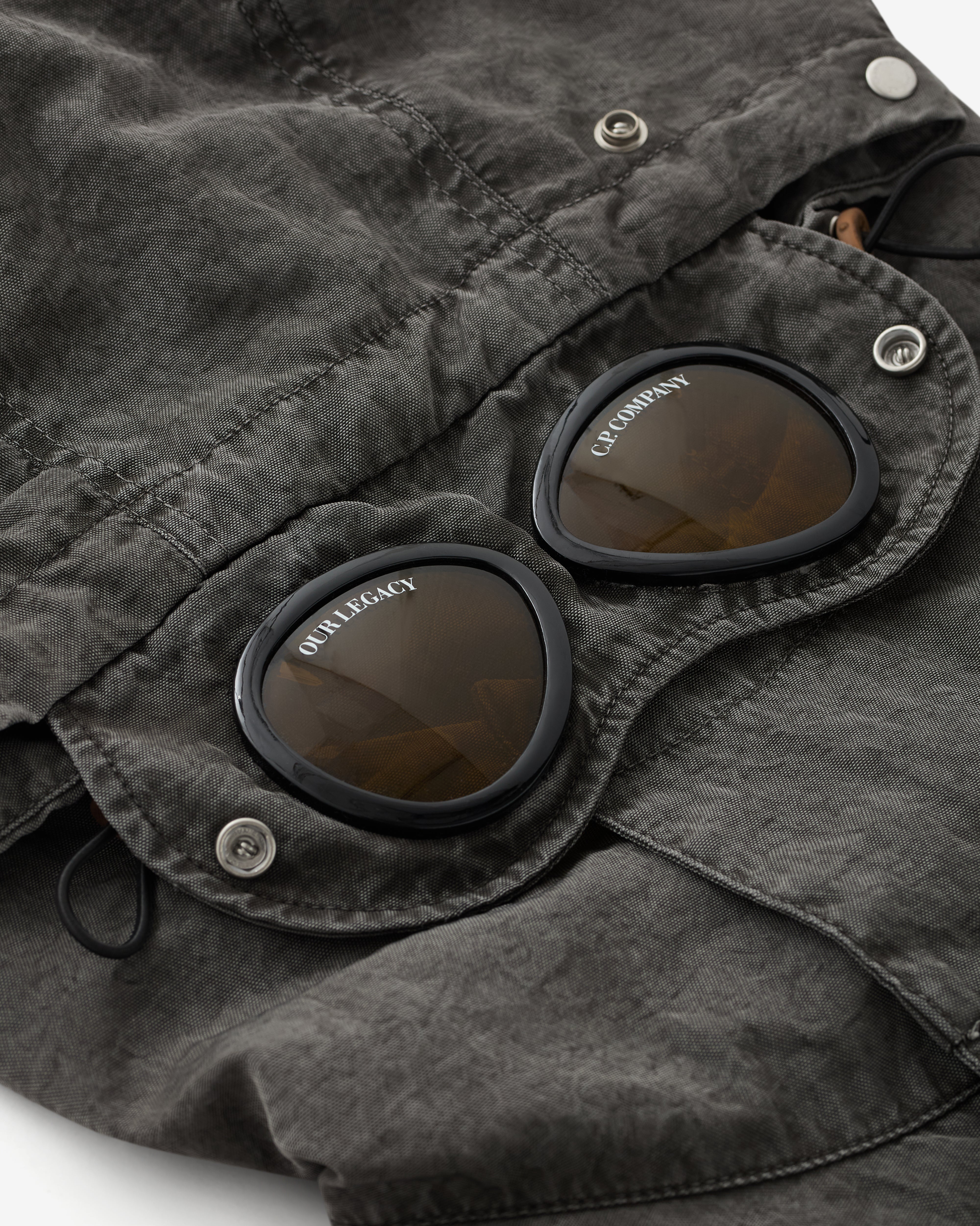Our Legacy Work Shop: Men's C.P. Company Mille Hood (After Dark
