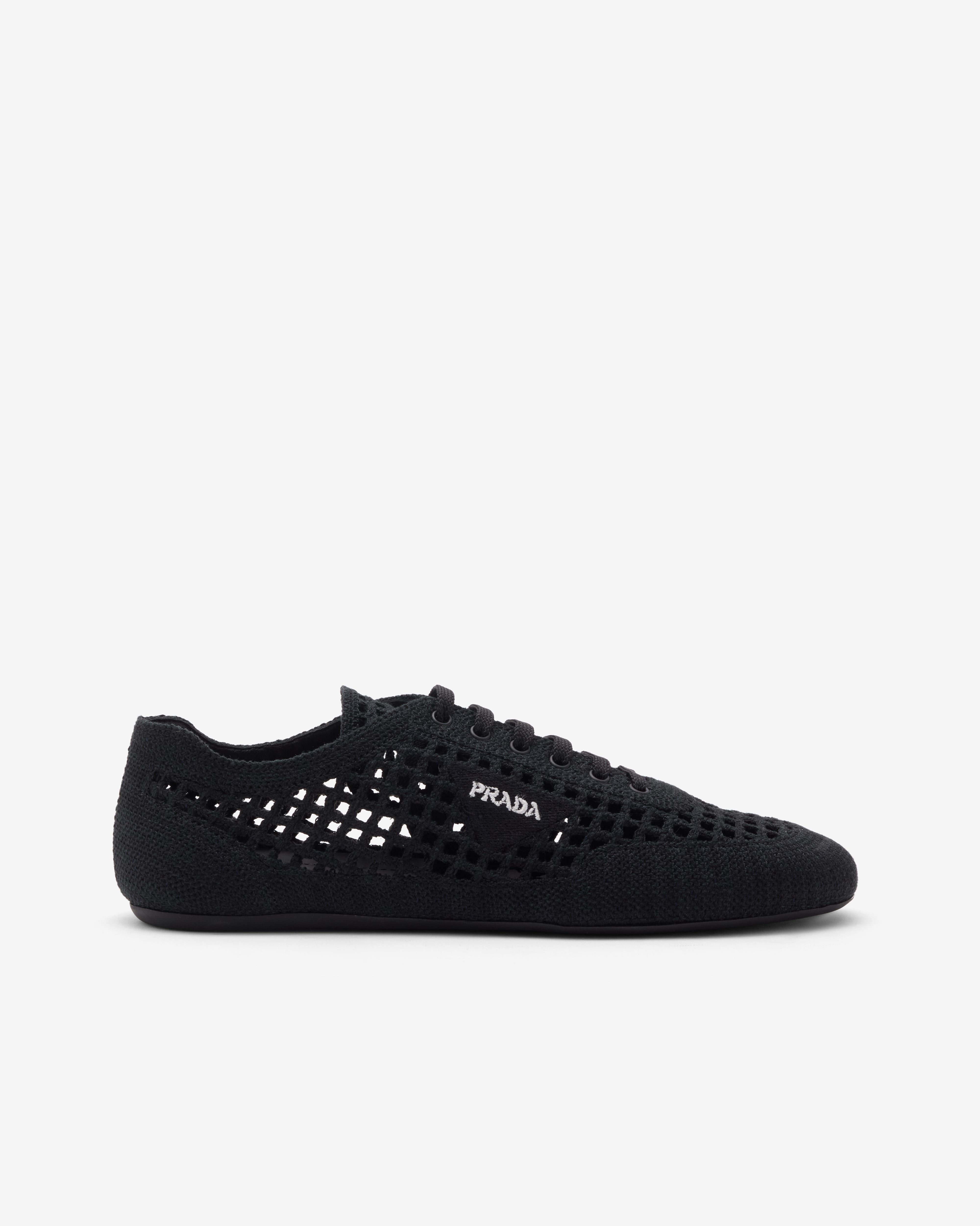 Prada: Women's Collapse Crochet Laced Sneakers (Black) | Dover