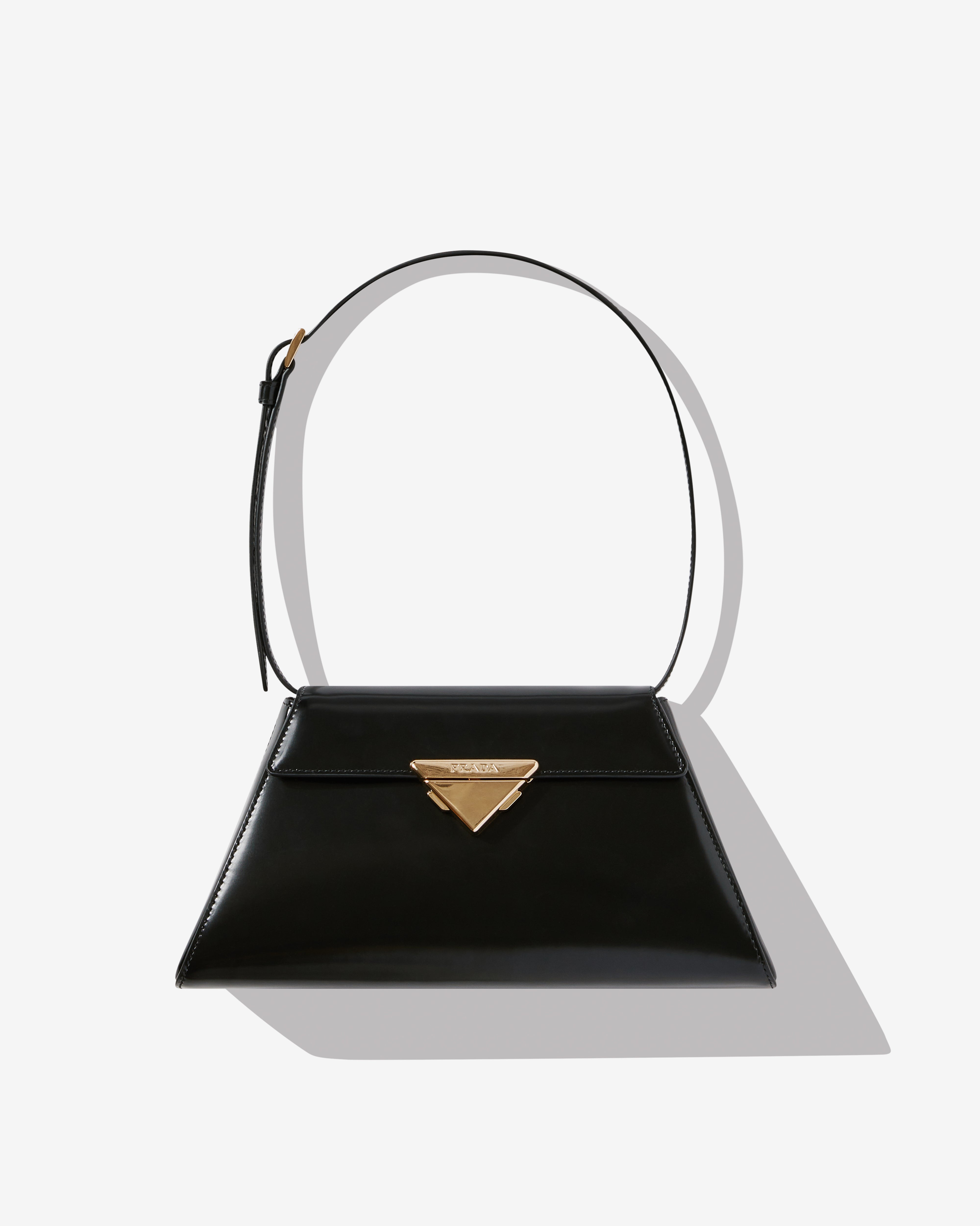 Black Galleria mini patent-leather handbag | Prada | MATCHES UK