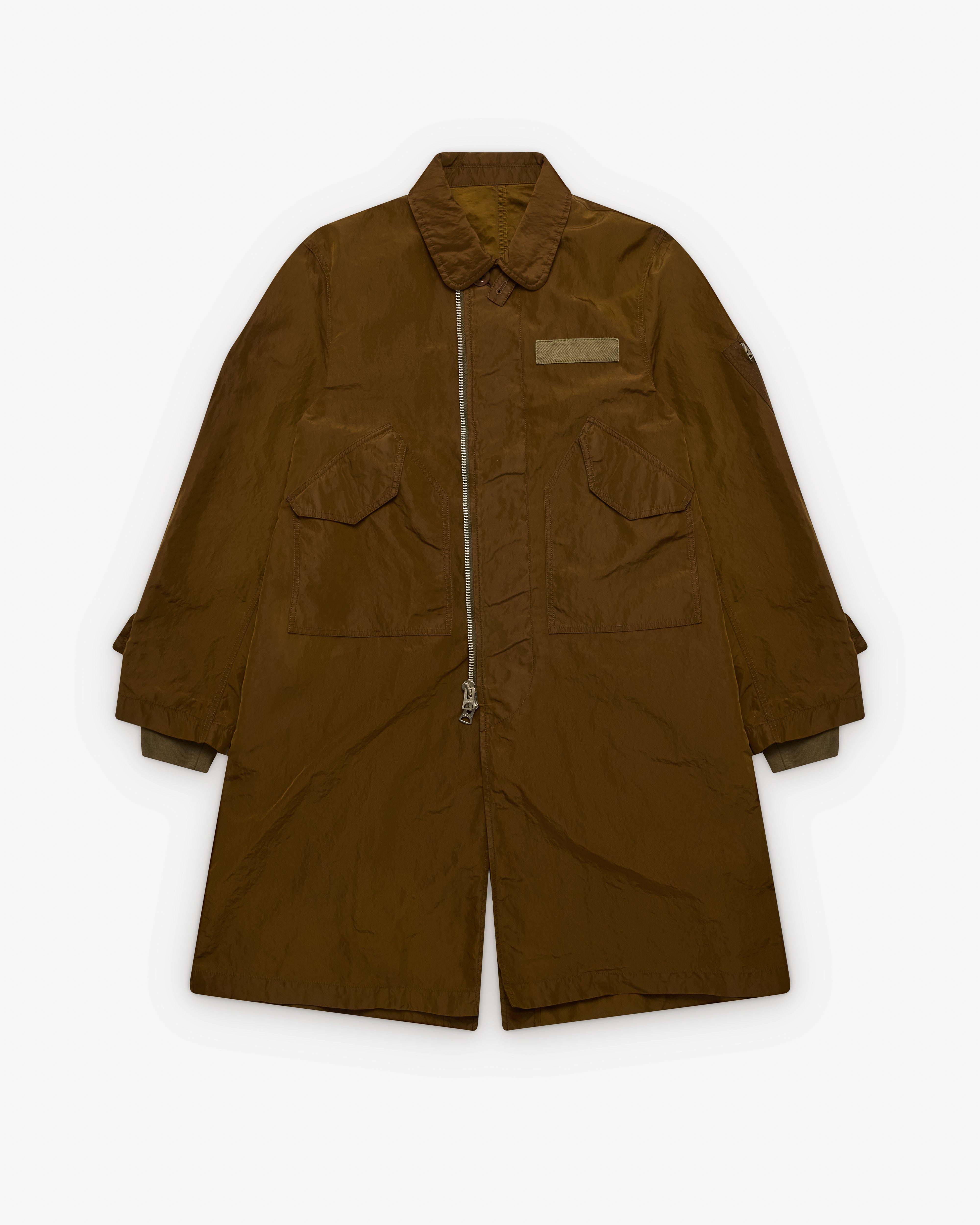 Sacai: Men's Treated Nylon Twill Coat (Green) | Dover Street