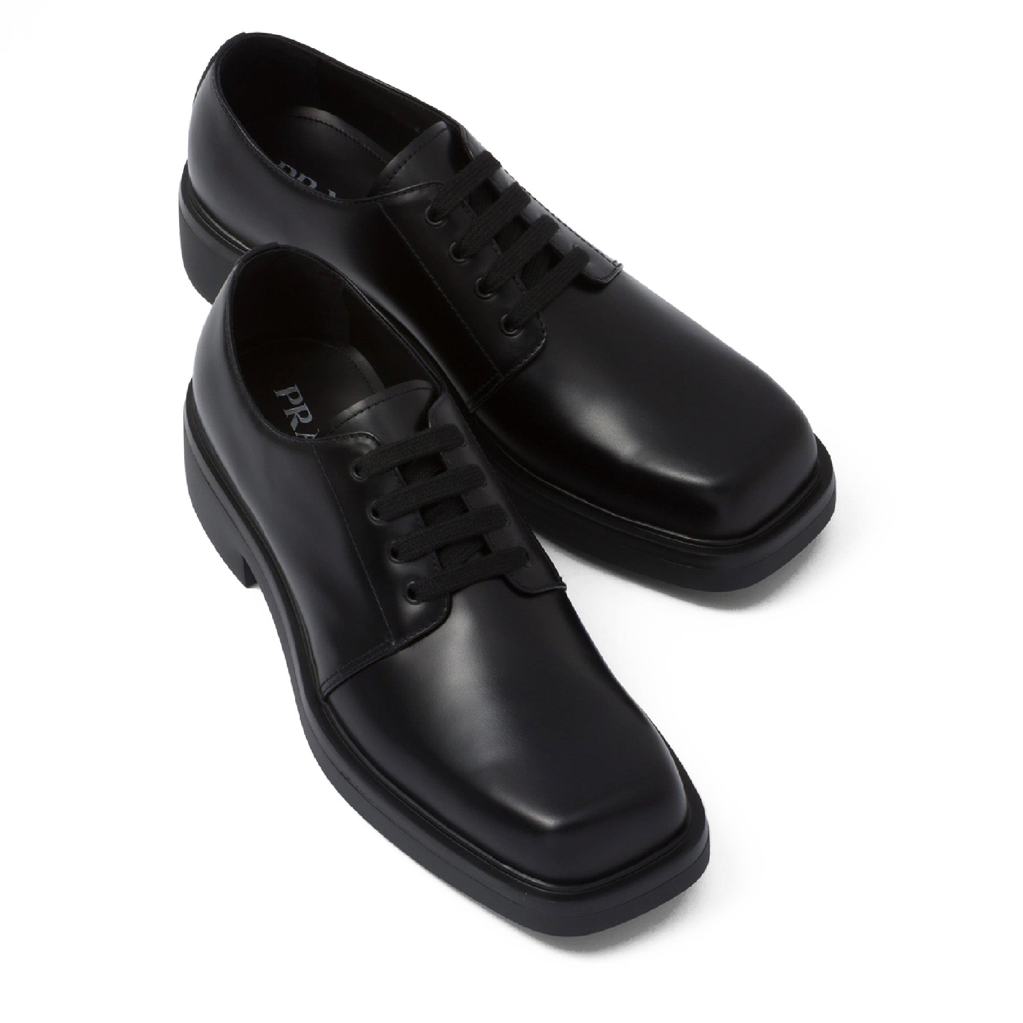 Prada: Men's Brushed Leather Derby Shoes (Black) | DSML E-SHOP